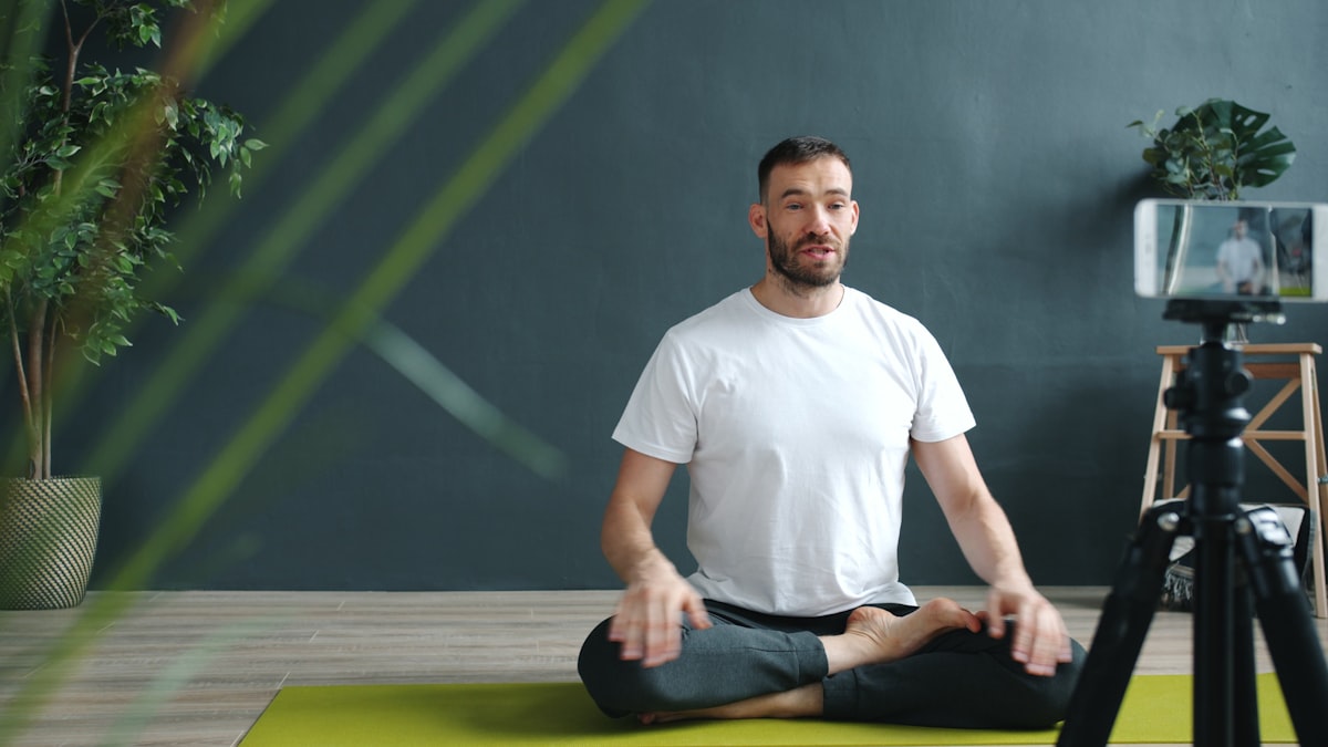 Fitness trainer explaining proper exercise technique to client